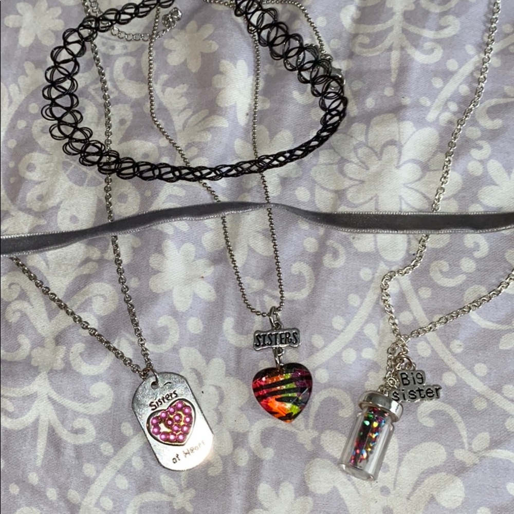 2 FREE chokers and a 3 piece sisters necklace set!
